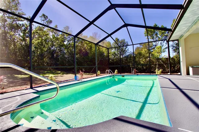a view of yard with a patio and a slide