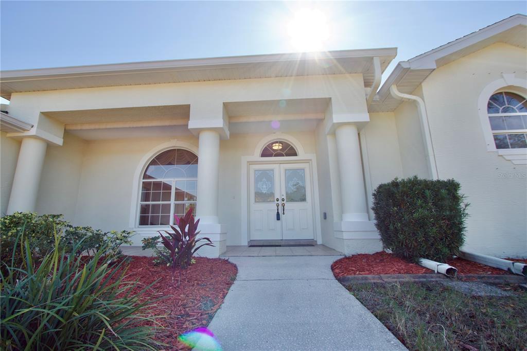 8056 Floral Drive Spring Hill, FL 34607 - Photo 8 of 29 a living room with furniture