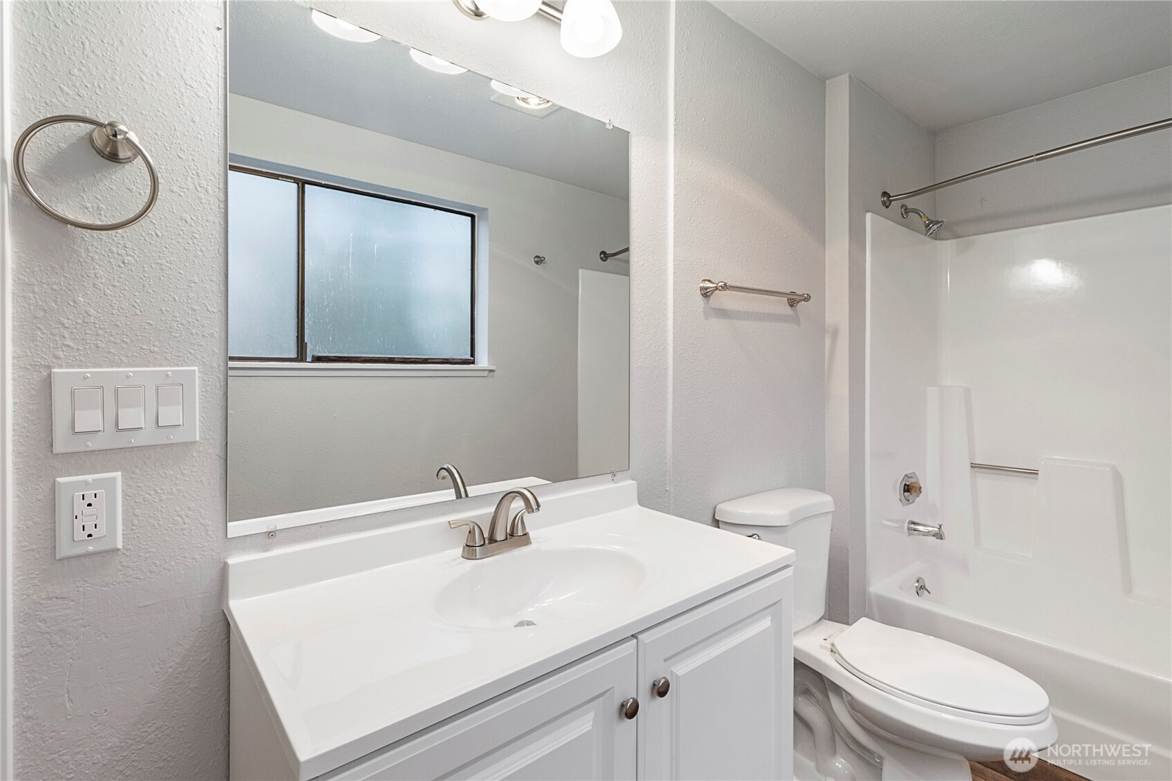 34007 1st Circle South Federal Way, WA 98003 - Photo 11 of 13 a bathroom with a sink toilet vanity and shower