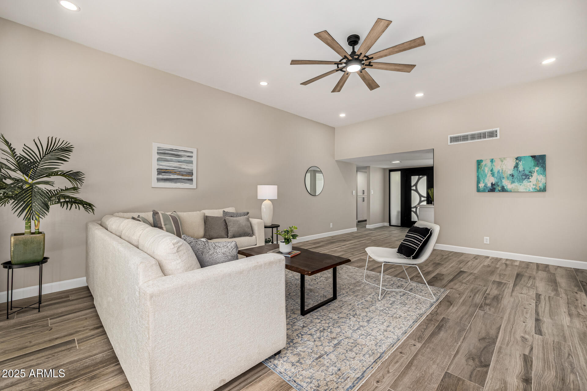 19 East Boca Raton Road Phoenix, AZ 85022 - Photo 24 of 54 a living room with furniture and a table