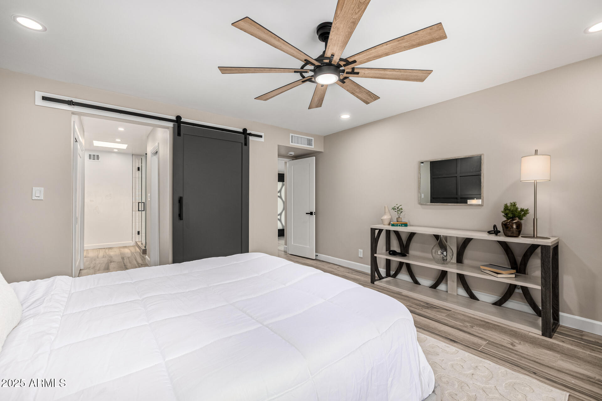 19 East Boca Raton Road Phoenix, AZ 85022 - Photo 35 of 54 a bedroom with a bed and a flat screen tv