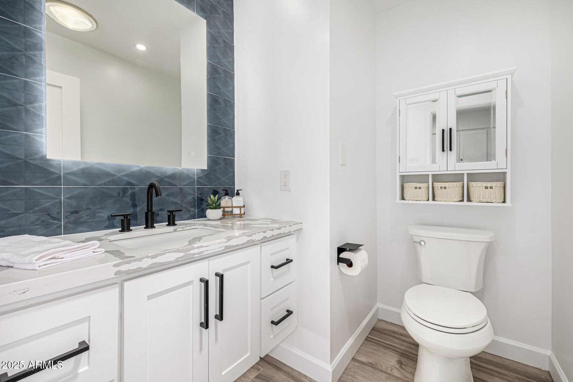 19 East Boca Raton Road Phoenix, AZ 85022 - Photo 40 of 54 a bathroom with a granite countertop toilet sink and mirror