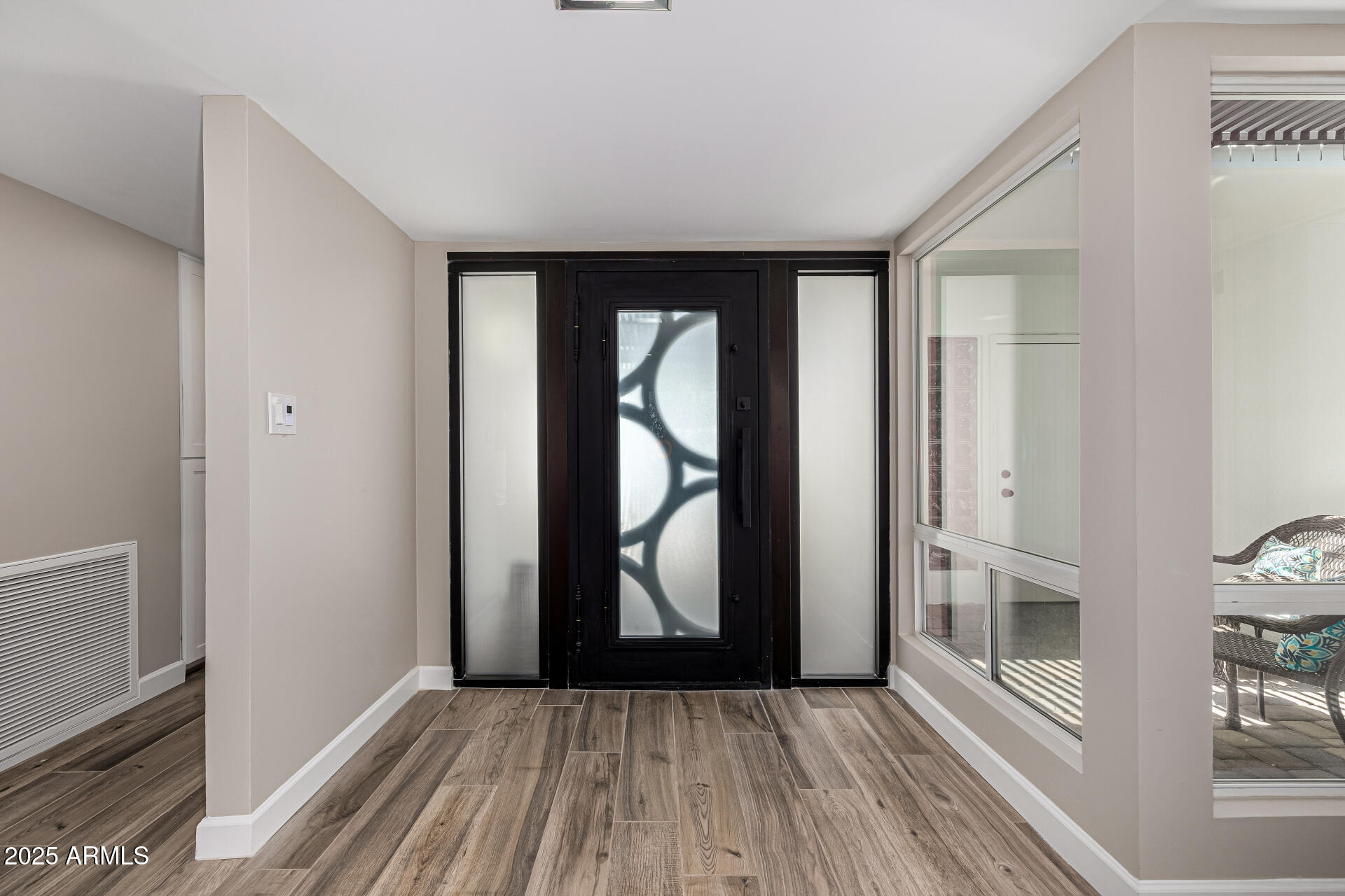 19 East Boca Raton Road Phoenix, AZ 85022 - Photo 7 of 54 a view of a room with wooden floor and a window