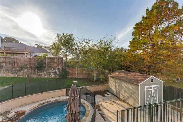 a view of a patio in backyard