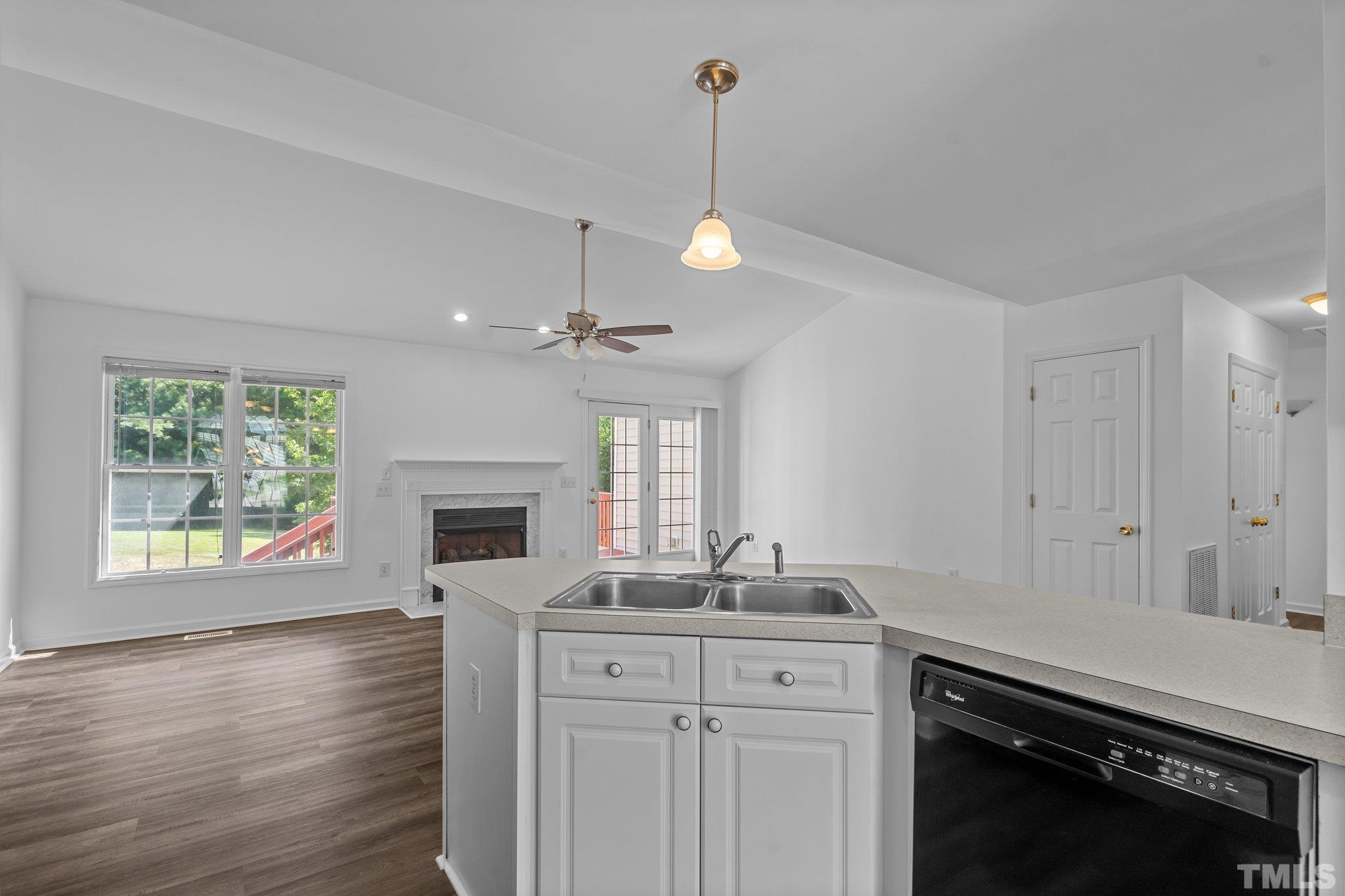 302 Laurel Drive Smithfield, NC 27577 - Photo 11 of 38 a kitchen with a stove oven and a kitchen island