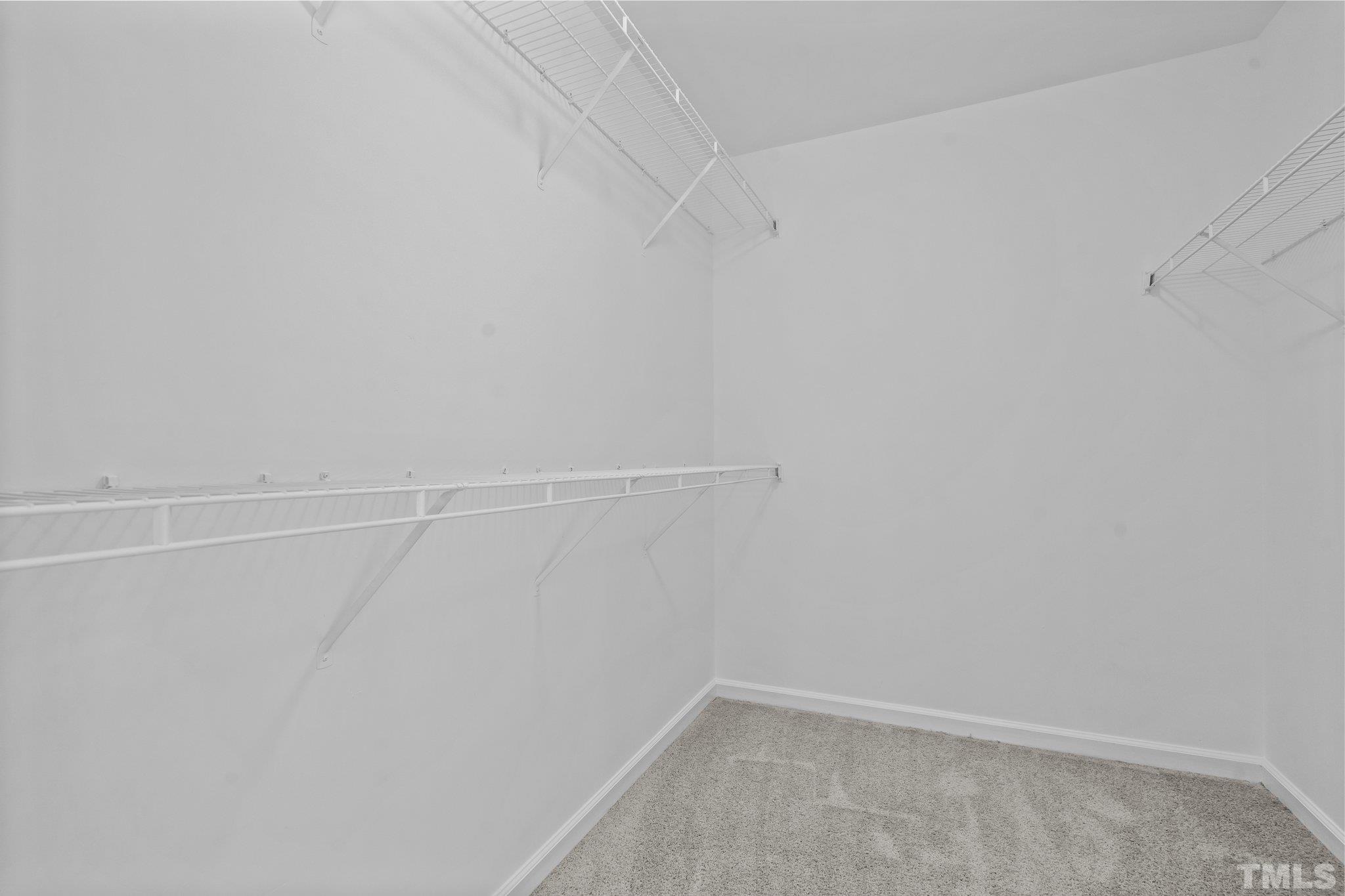 302 Laurel Drive Smithfield, NC 27577 - Photo 25 of 38 a view of a room with racks on the wall