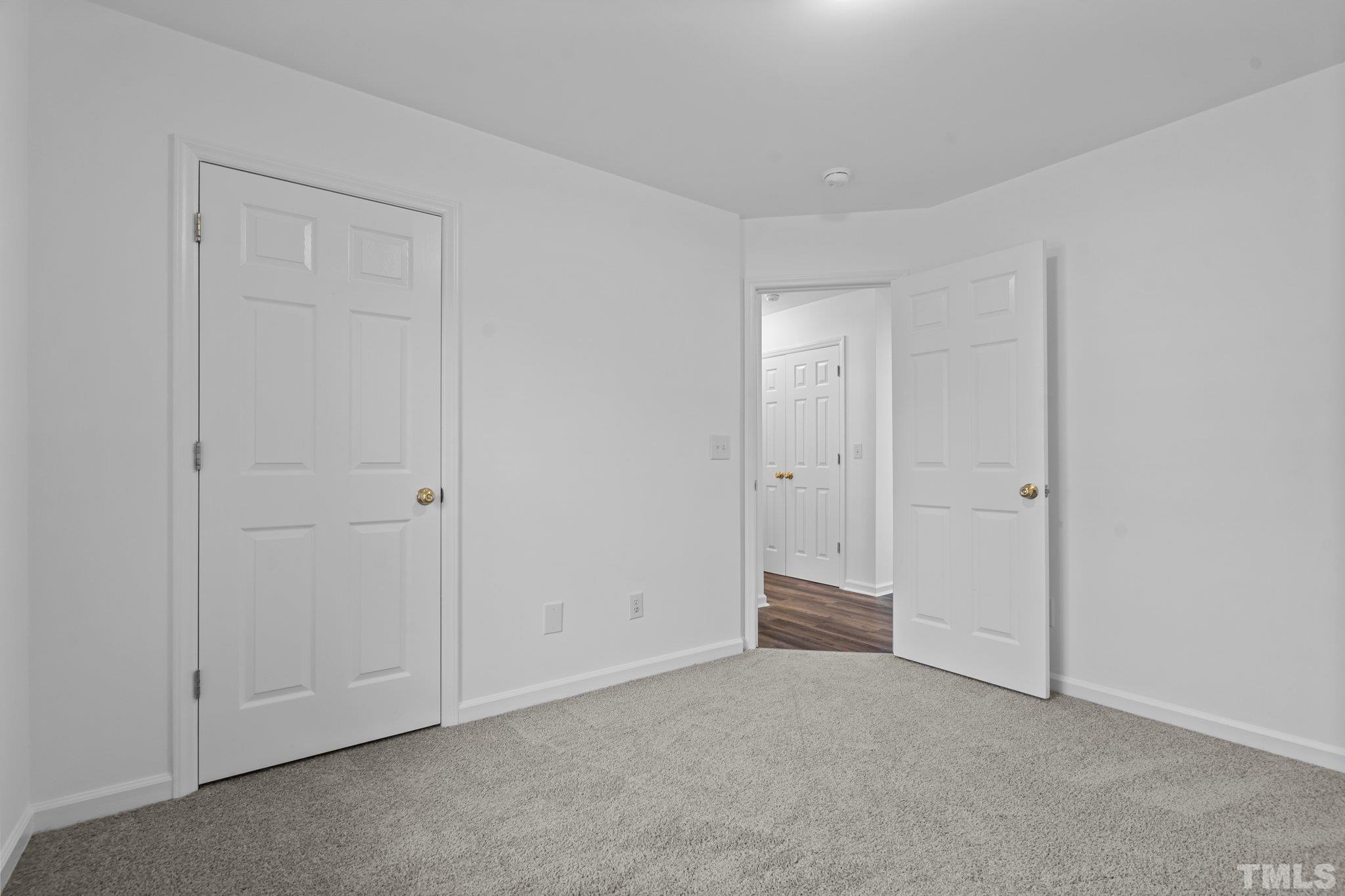 302 Laurel Drive Smithfield, NC 27577 - Photo 28 of 38 a view of an empty room