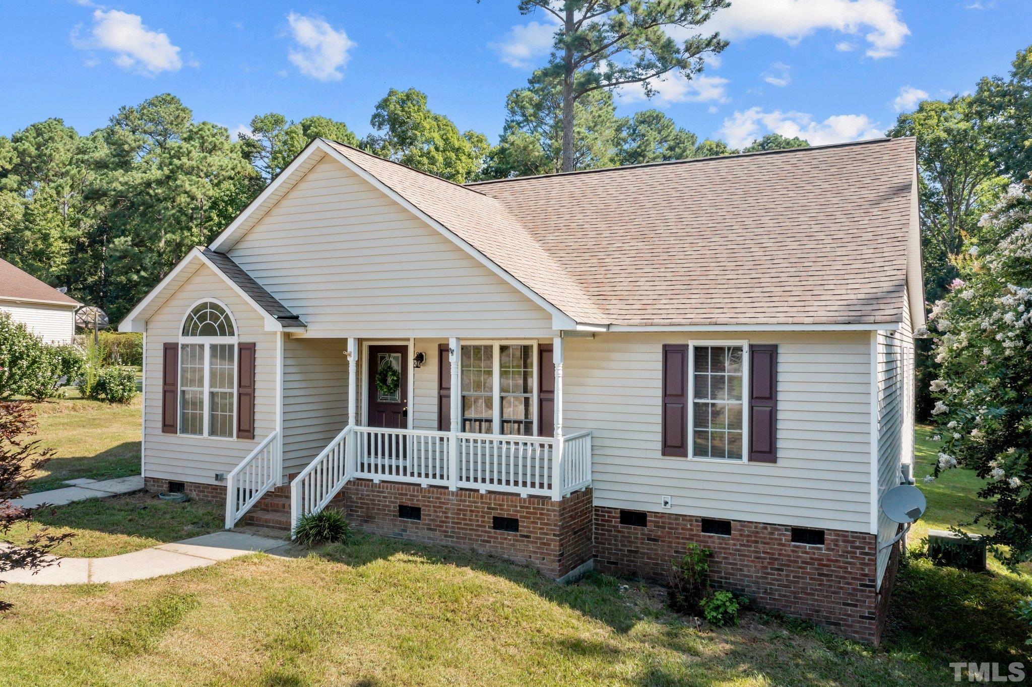 302 Laurel Drive Smithfield, NC 27577 - Photo 3 of 38 a view of a house with yard and sitting area
