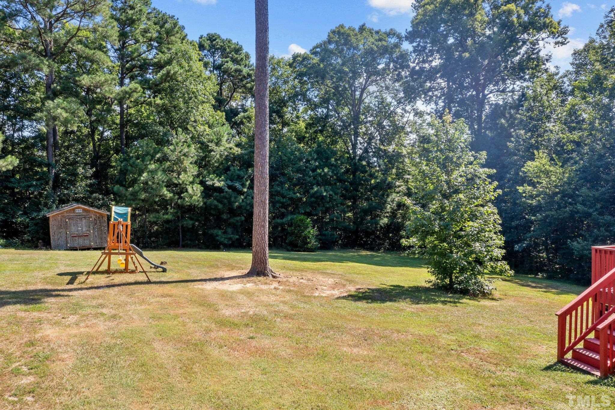 302 Laurel Drive Smithfield, NC 27577 - Photo 31 of 38 a view of outdoor space with swimming pool