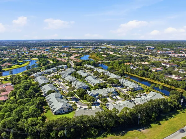 an aerial view of residential building and ocean
