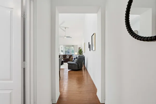 a view of a bedroom from a corridor