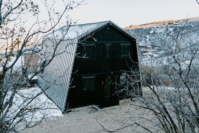 1413 Basel Drive Midway, UT 84049 - Photo 92 of 137 Rear view of house featuring a gambrel roof