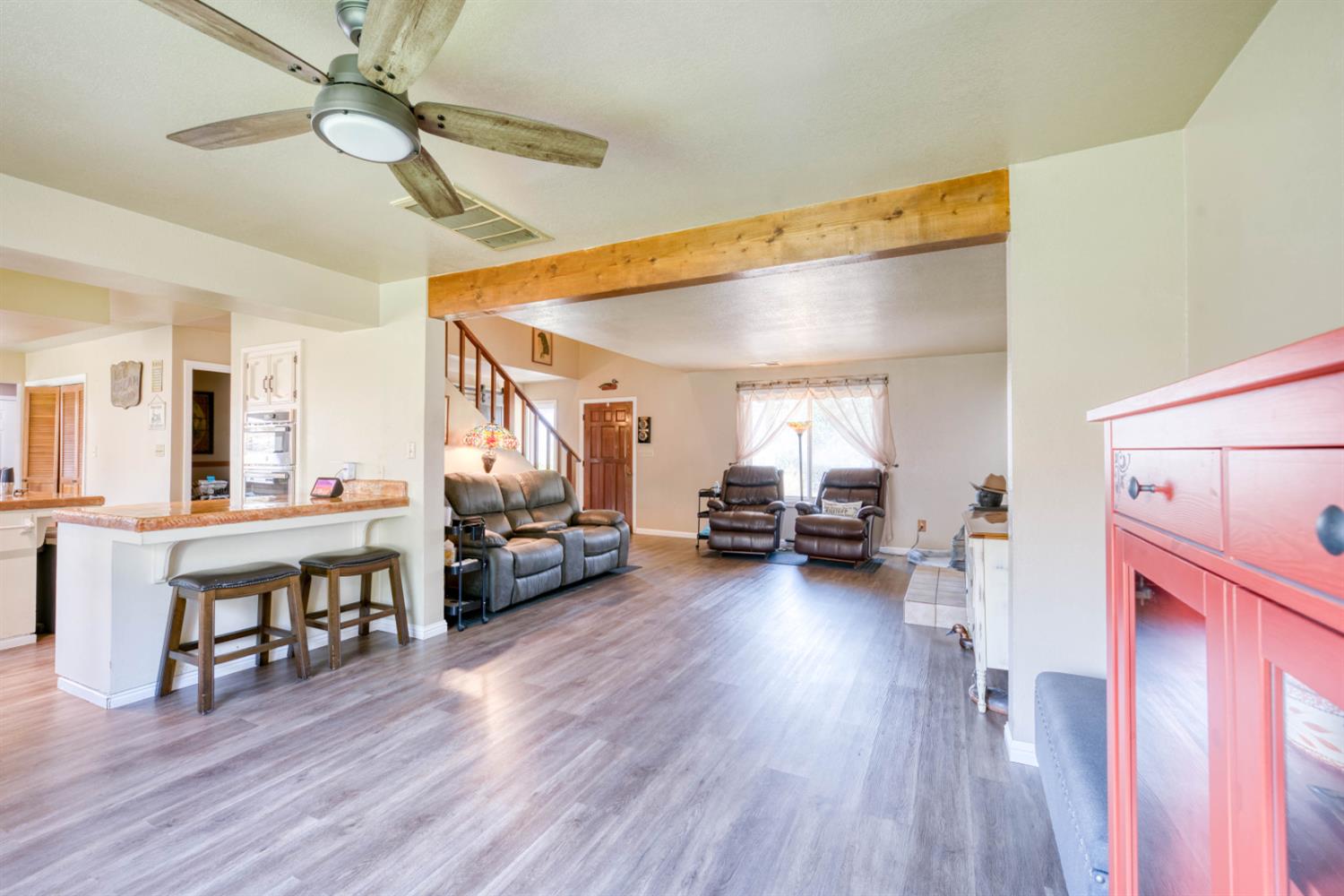 15656 Millerton Road Prather, CA 93651 - Photo 23 of 56 a living room with furniture and a wooden floor