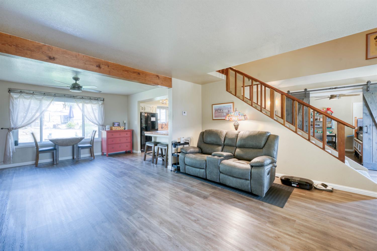 15656 Millerton Road Prather, CA 93651 - Photo 25 of 56 a living room with furniture and a wooden floor
