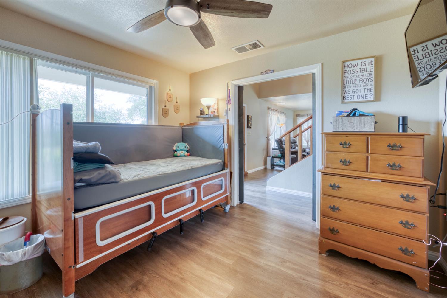 15656 Millerton Road Prather, CA 93651 - Photo 30 of 56 a living room with furniture and a dresser