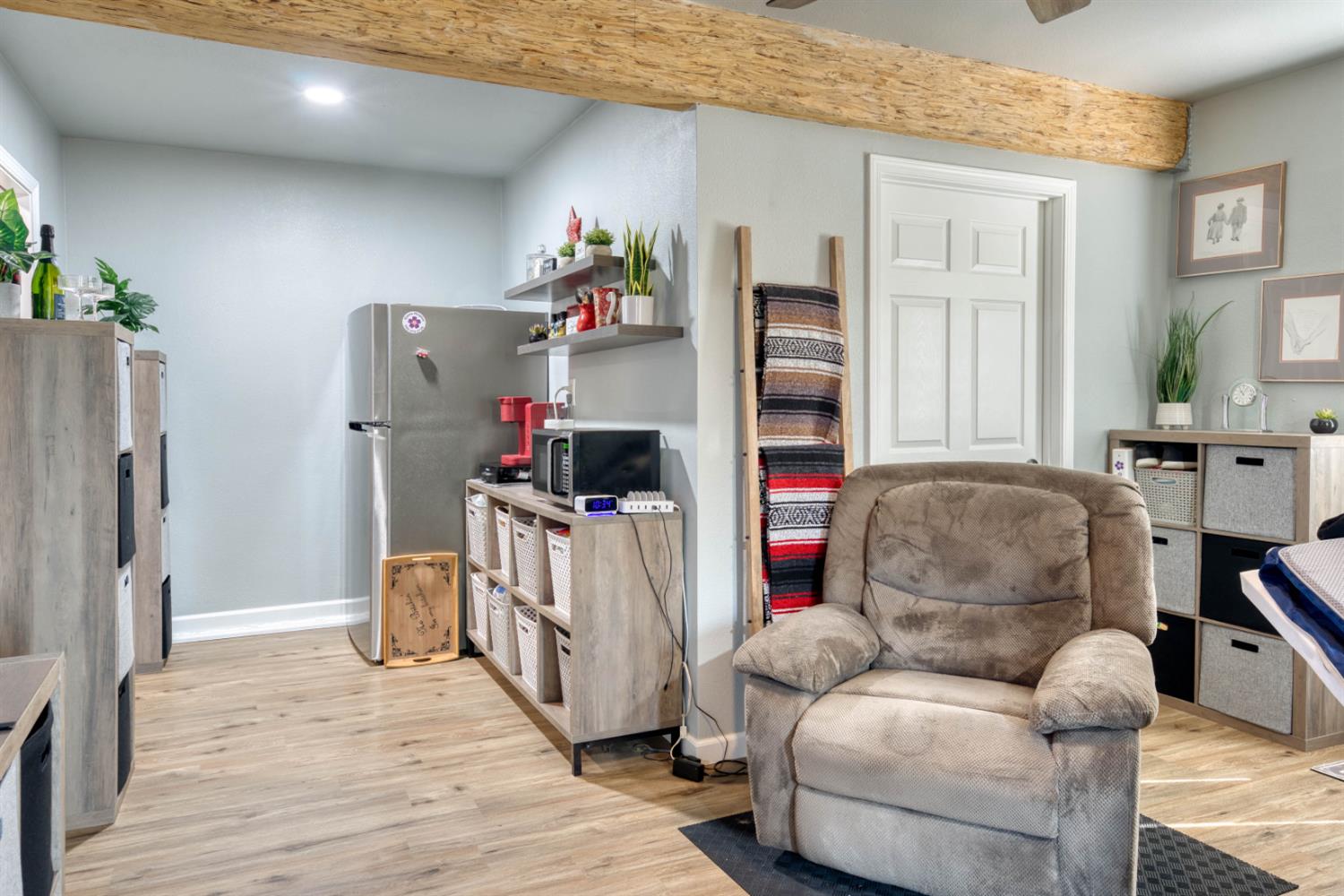 15656 Millerton Road Prather, CA 93651 - Photo 35 of 56 a living room with furniture and a refrigerator