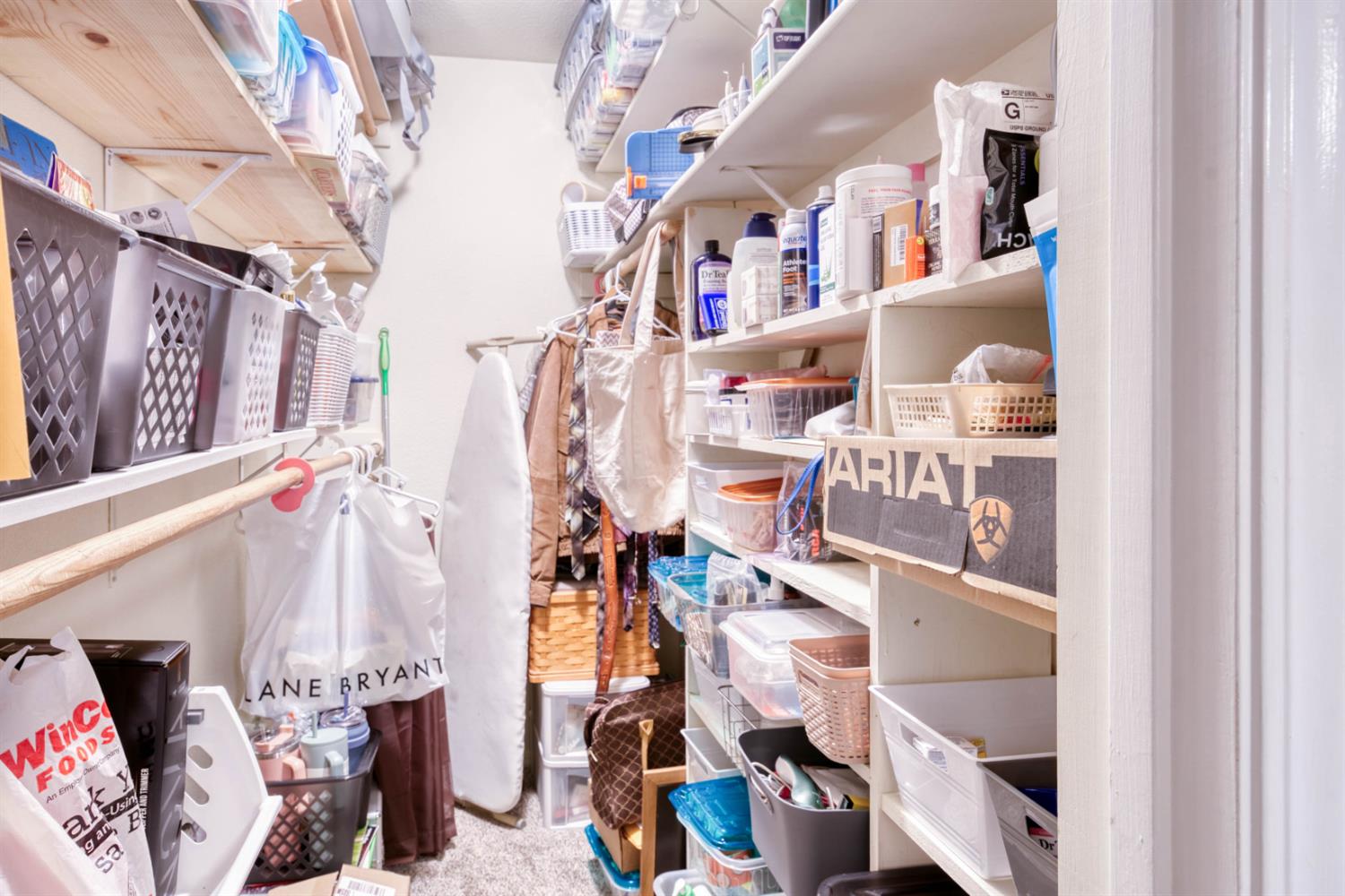 15656 Millerton Road Prather, CA 93651 - Photo 45 of 56 a view of walk in closet with clothes and shoes