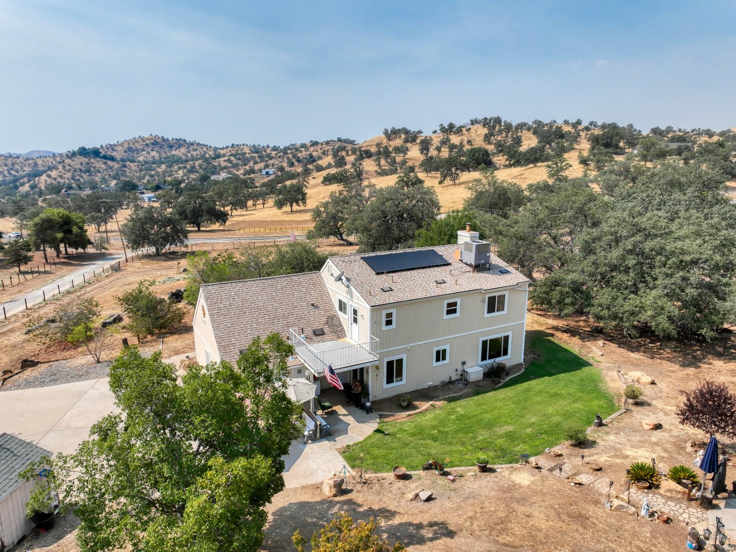 15656 Millerton Road Prather, CA 93651 - Photo 49 of 56 an aerial view of a house with a yard