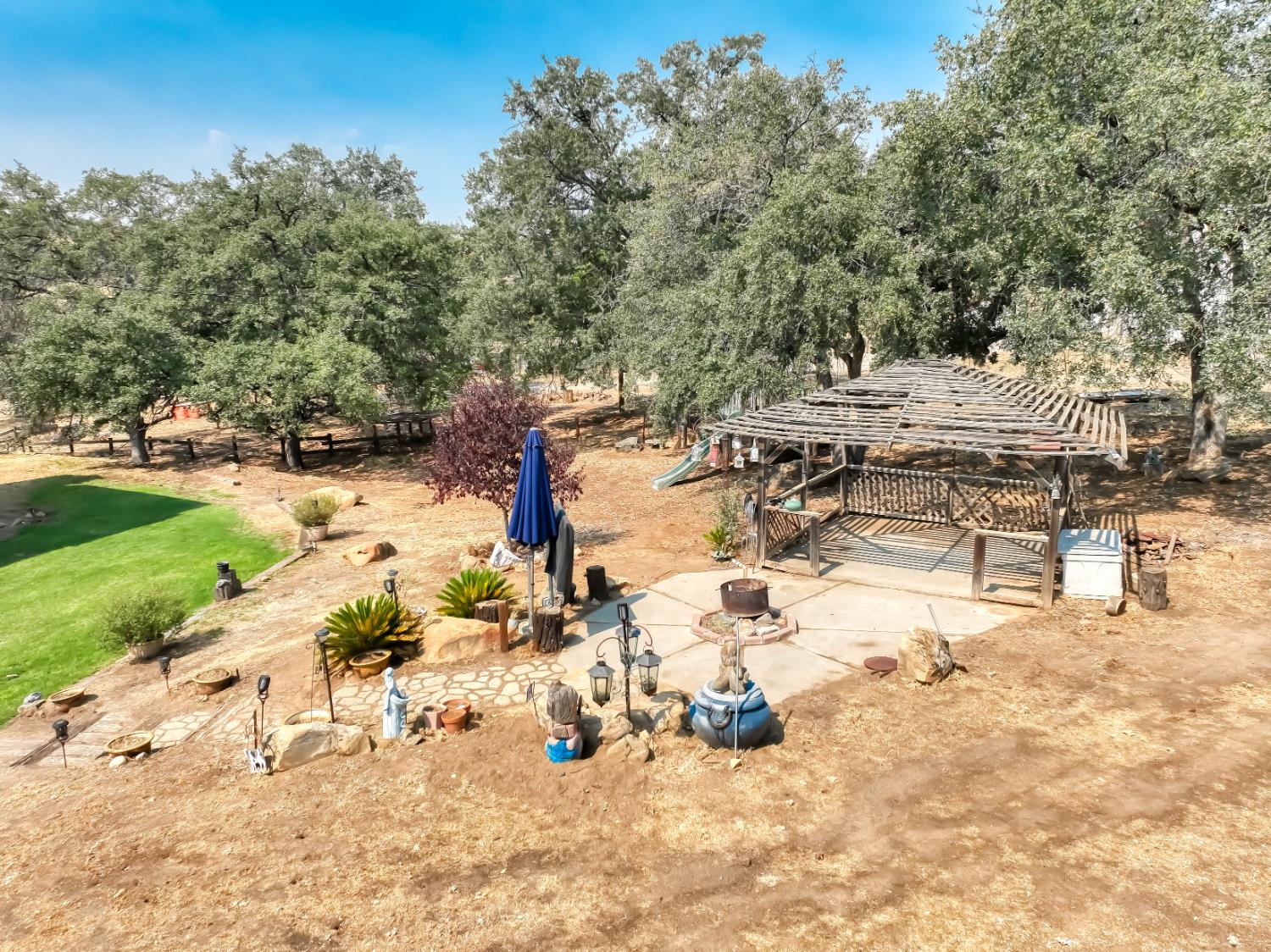15656 Millerton Road Prather, CA 93651 - Photo 55 of 56 a view of a yard with a tree