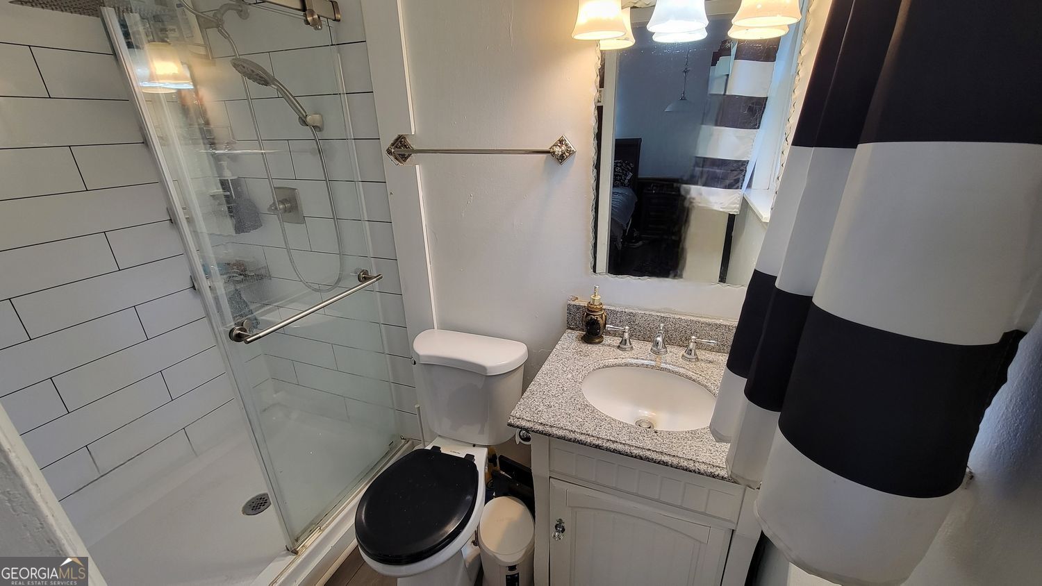 128 Wassaw Road Savannah, GA 31410 - Photo 13 of 22 a bathroom with a sink toilet and shower