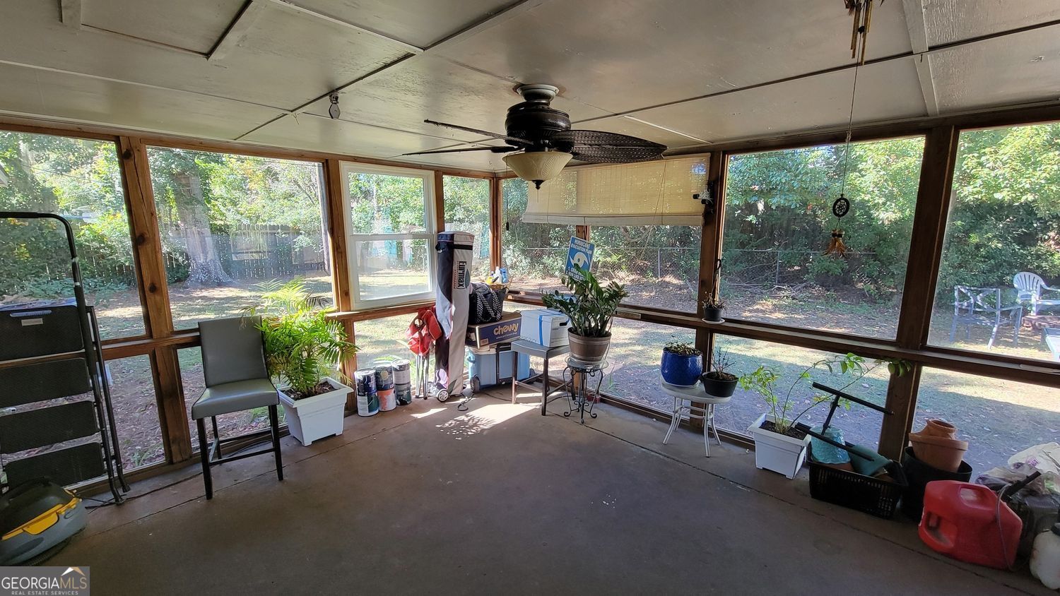 128 Wassaw Road Savannah, GA 31410 - Photo 19 of 22 a room with furniture and a large window