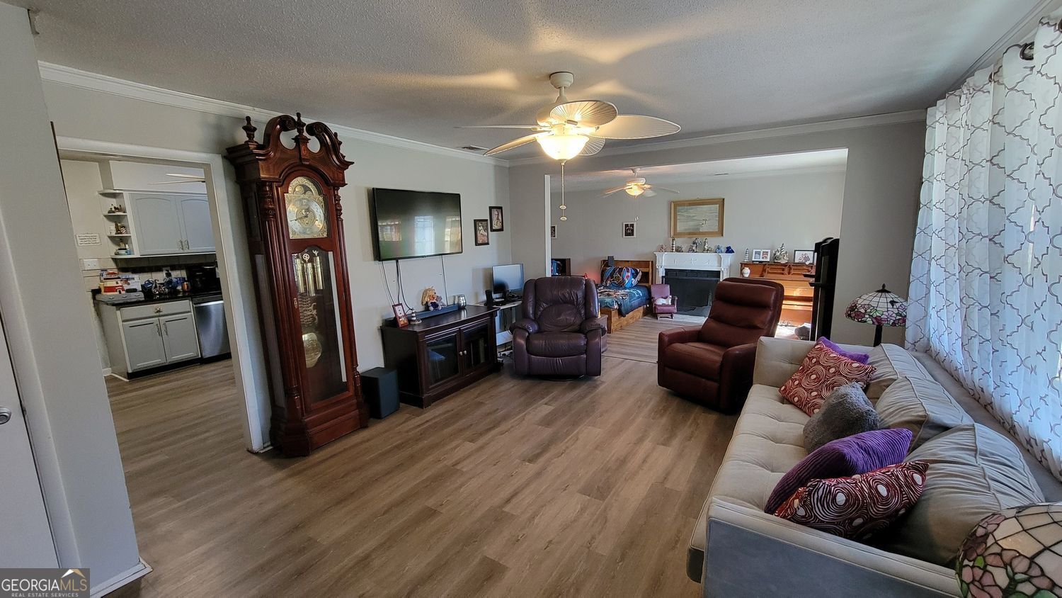 128 Wassaw Road Savannah, GA 31410 - Photo 3 of 22 a living room with furniture and wooden floor