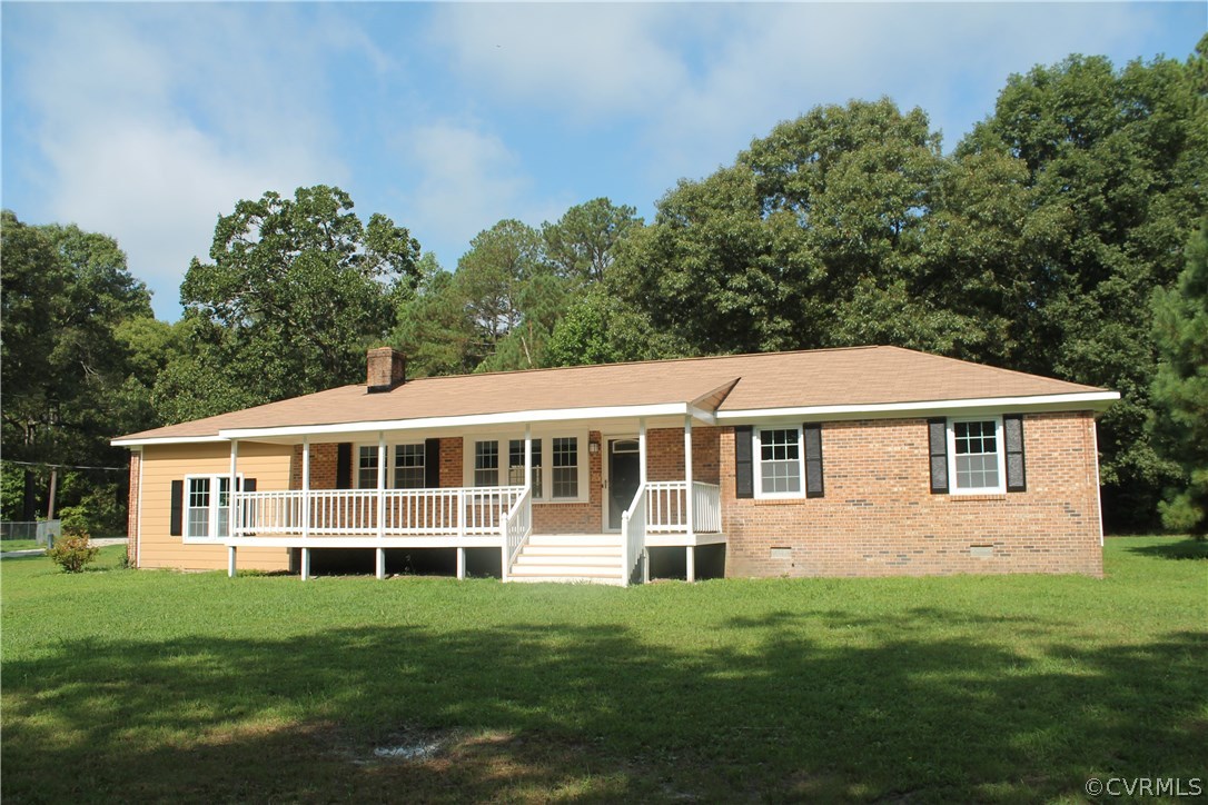 17500 Sandy Ford Road Chesterfield, VA 23838 - Photo 3 of 47 a front view of a house with a garden