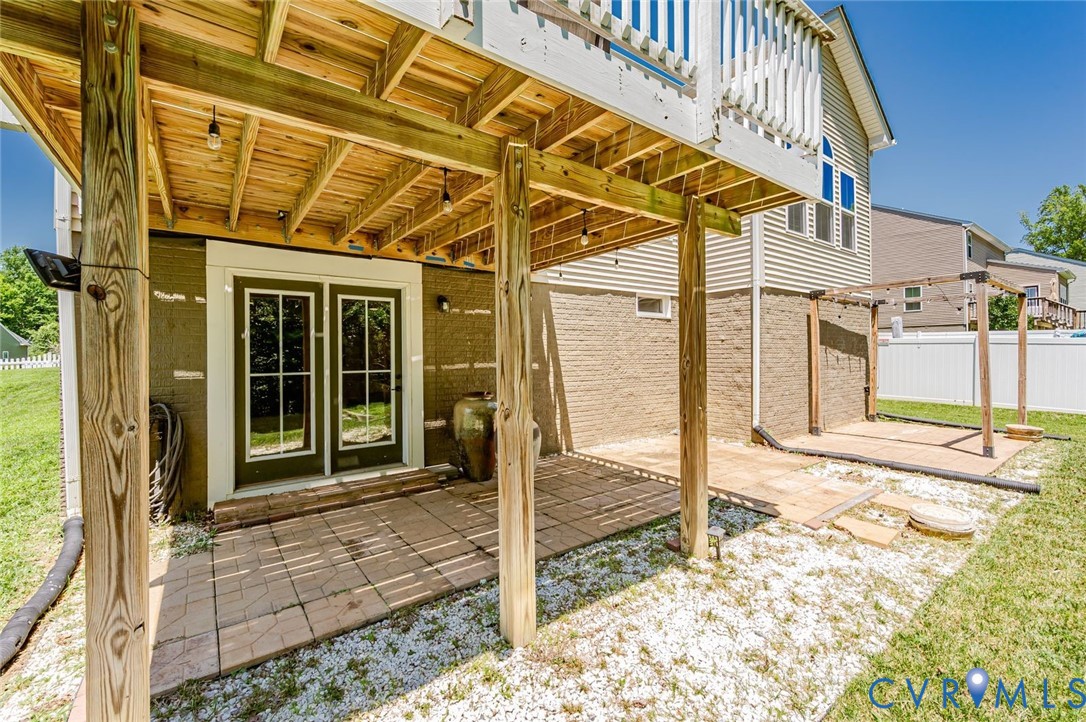 7435 Wicks Road Williamsburg, VA 23188 - Photo 77 of 82 Rear Basement Entrance