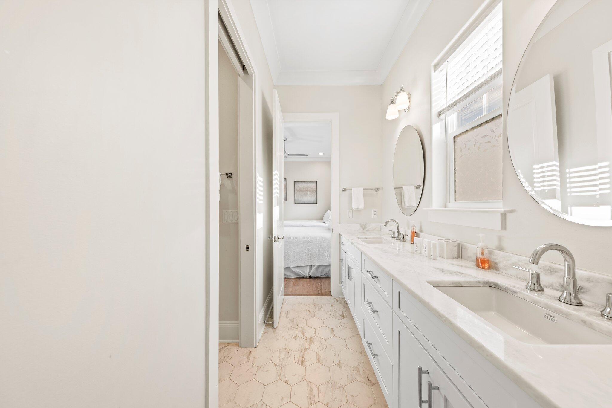 17 Sunset Key Court Inlet Beach, FL 32461 - Photo 38 of 75 a spacious bathroom with a double vanity sink and a mirror