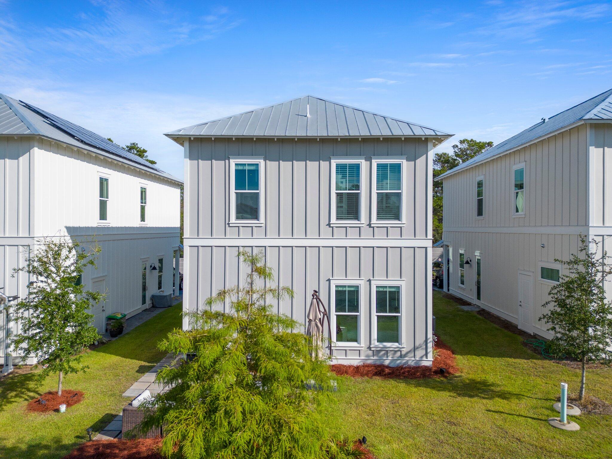 17 Sunset Key Court Inlet Beach, FL 32461 - Photo 54 of 75 a front view of a house with a yard