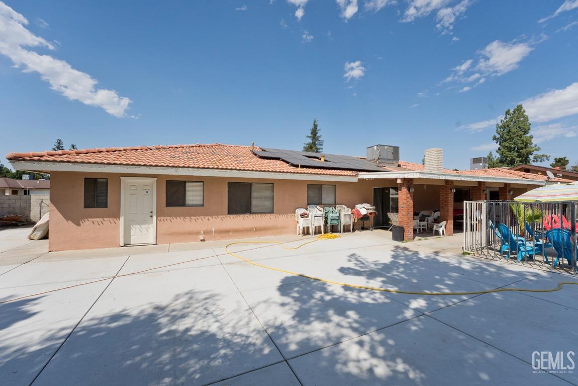 Undisclosed Address Bakersfield, CA 93309 - Photo 33 of 37 a front view of a house with a patio