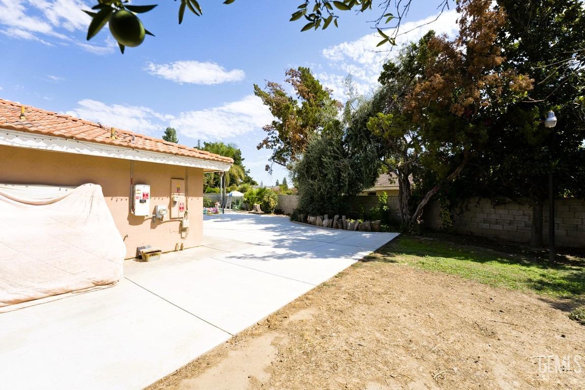 Undisclosed Address Bakersfield, CA 93309 - Photo 36 of 37 a view of a backyard of the house