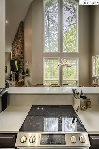 a kitchen with a stove and a sink