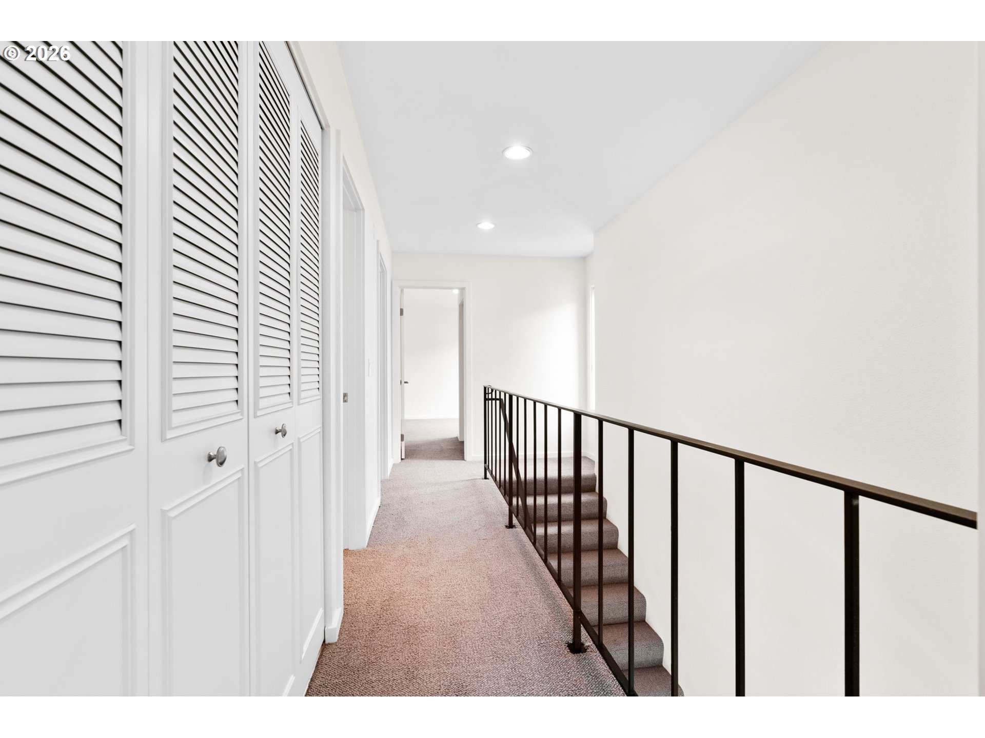 1442 Southwest 66th Avenue Portland, OR 97225 - Photo 21 of 31 a view of a hallway with wooden floor