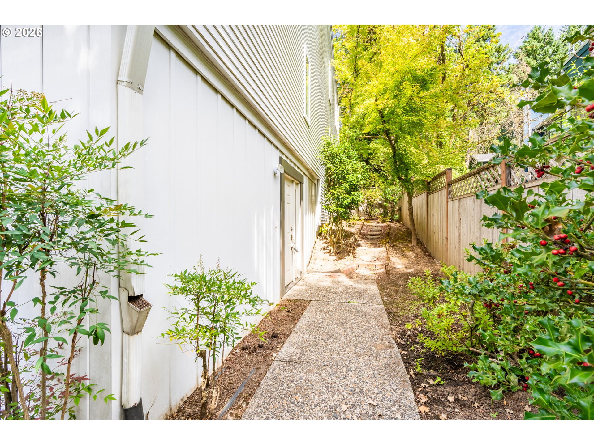 1442 Southwest 66th Avenue Portland, OR 97225 - Photo 29 of 31 a view of a backyard with potted plants