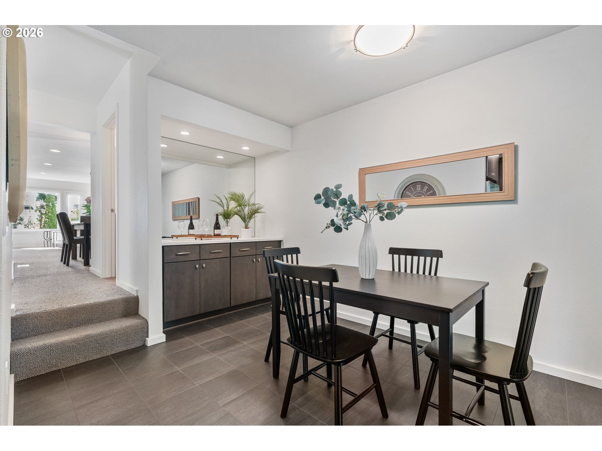 1442 Southwest 66th Avenue Portland, OR 97225 - Photo 6 of 31 a view of a dining room with furniture and wooden floor
