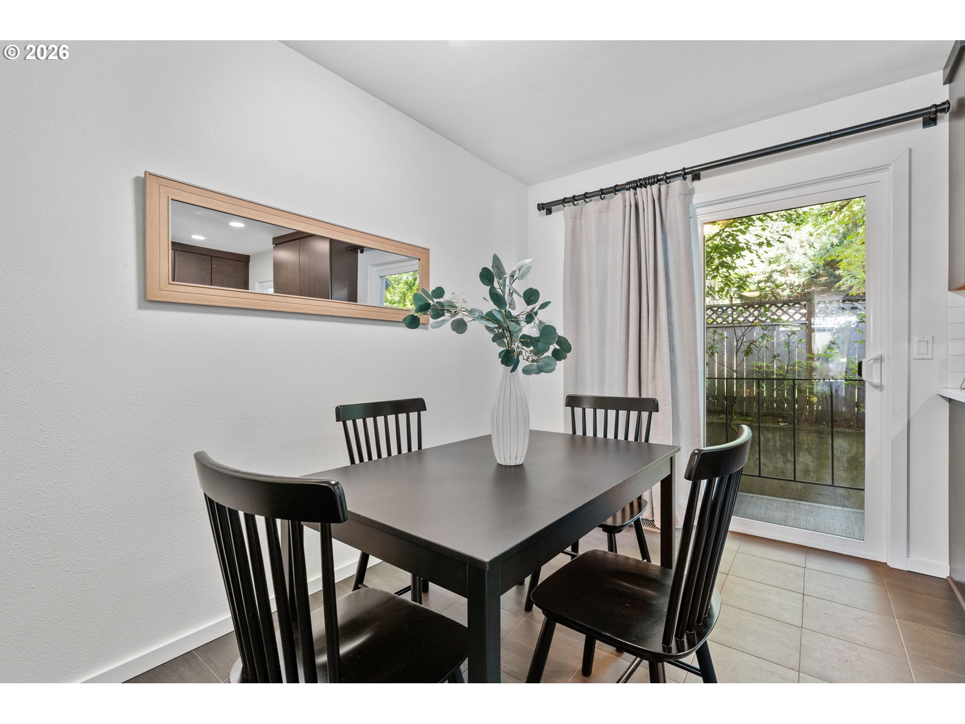 1442 Southwest 66th Avenue Portland, OR 97225 - Photo 8 of 31 a view of a dining room with furniture window and wooden floor