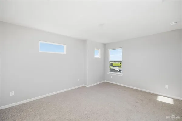 a bathroom with a sink a shower and a mirror