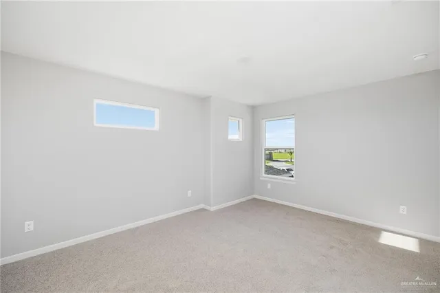 a bathroom with a sink a shower and a mirror