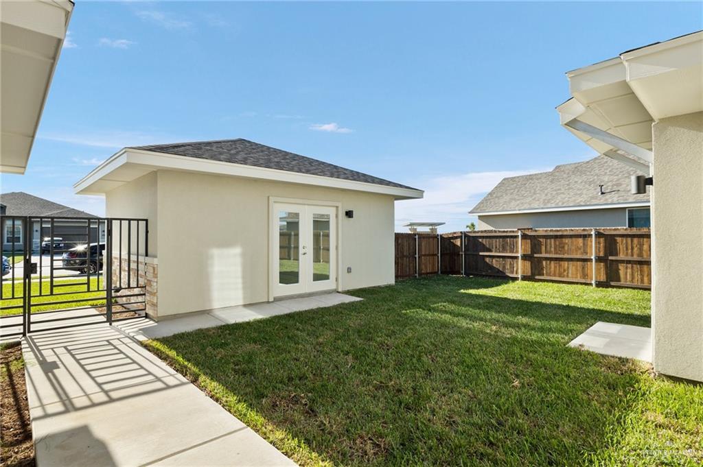 14616 Aqualina Way McAllen, TX 78504 - Photo 17 of 26 a front view of a house with a yard