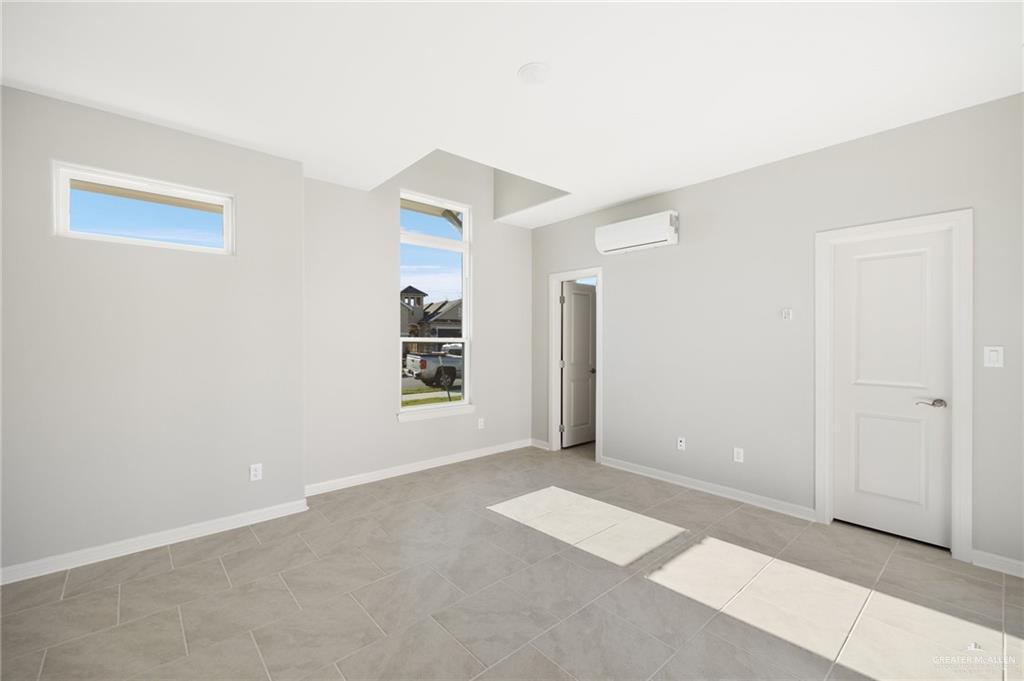 14616 Aqualina Way McAllen, TX 78504 - Photo 18 of 26 a view of an empty room with a window