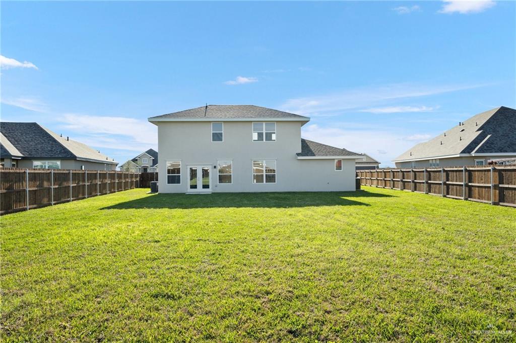 14616 Aqualina Way McAllen, TX 78504 - Photo 19 of 26 a view of a house with a yard from a lake view