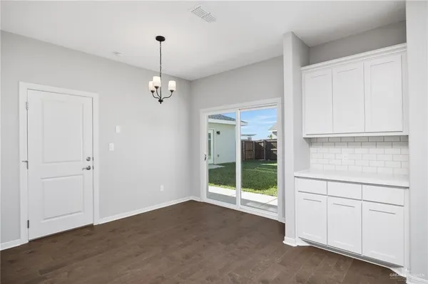 a view of a room with an empty space