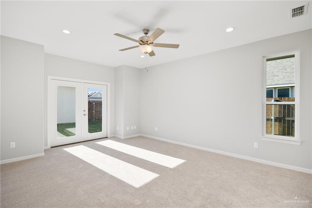 14616 Aqualina Way McAllen, TX 78504 - Photo 7 of 26 a view of an empty room with a window