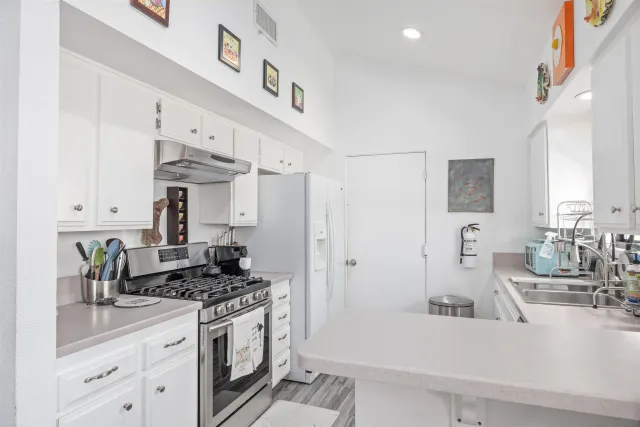 a bedroom with a bed furniture and a window