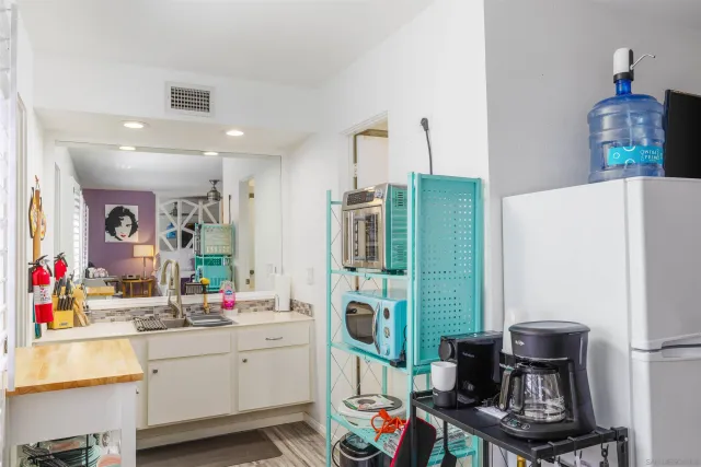 a backyard of a house with outdoor seating