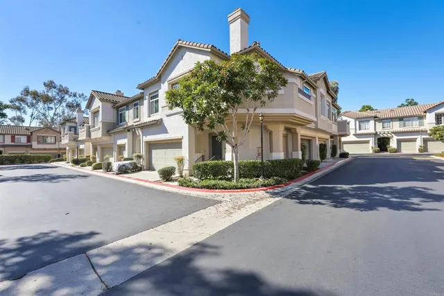 a view of a building with a street