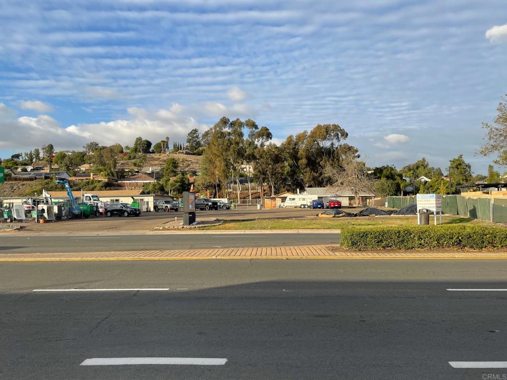 13044 Poway Road Poway, CA 92064 - Photo 4 of 21 a view of a building with a swimming pool