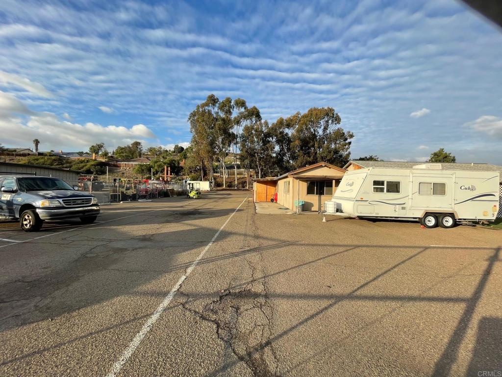 13044 Poway Road Poway, CA 92064 - Photo 6 of 21 a view of a city street with cars