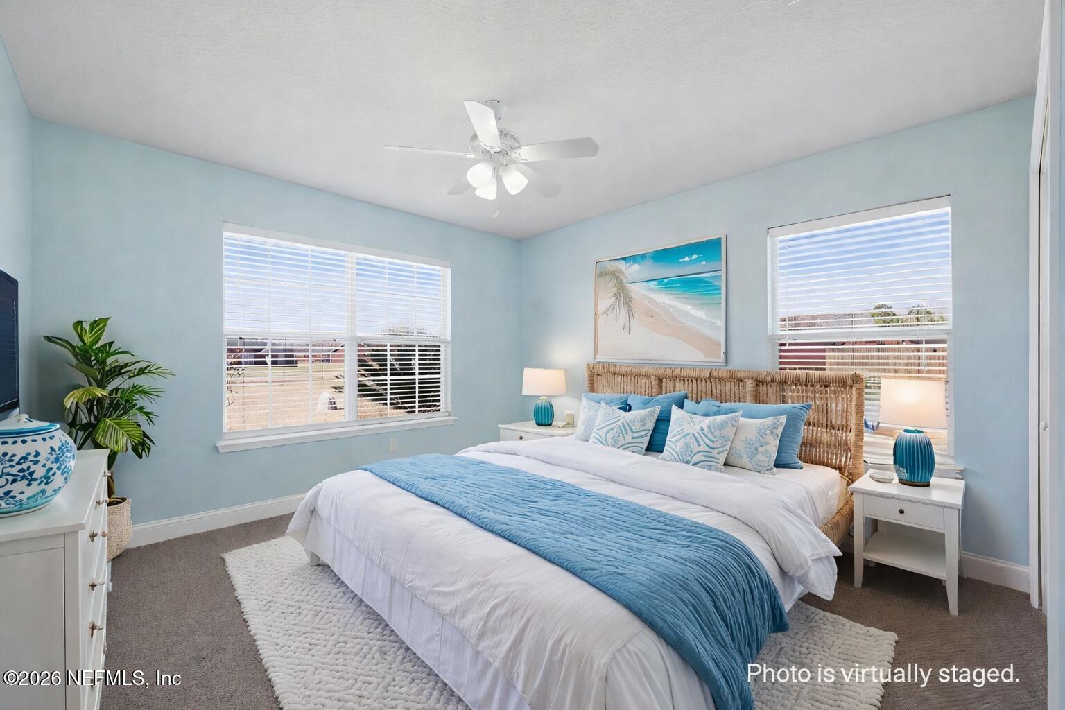 44808 Green Meadows Lane Callahan, FL 32011 - Photo 20 of 41 a bedroom with a large bed and a window